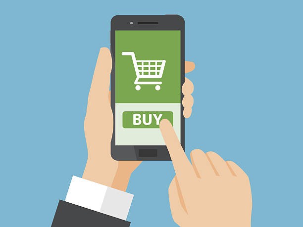 Cartoon mans hands holding a mobile phone with a shopping cart and a buy button on the phone screen. Step one of the website design process